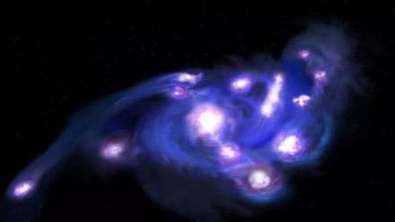 Detectan una antigua galaxia con forma de racimo de uvas en proceso de desintegración.